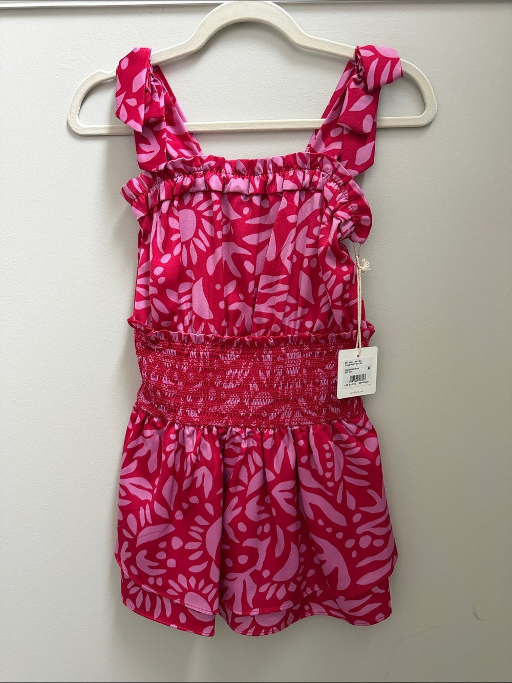 NWT Chelsea & Violet Bright Pink Floral Smocked Romper with Light-Pink Pattern